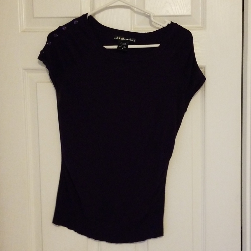 Purple short sleeve sweater.